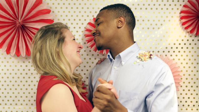 Illustration for article titled This Interracial Couple Is So Beautiful You Won’t Even Care One Of Them Has Coleslaw On His Shoulder